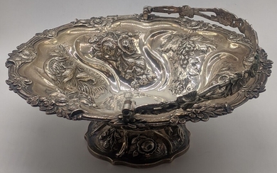 A large Victorian silver bowl, embossed with splays of...