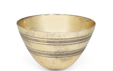 A large silver gilt centrepiece bowl, London, c.1999, maker's mark MA, also with millennium mark, the circular body tapering to a narrow base and decorated with reeded banding, 15cm high, 25cm dia., approx. weight 70oz