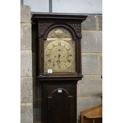 A late 18th century oak eight day longcase clock, with brass...