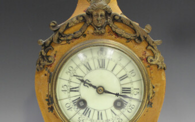 A late 19th century French vernis Martin cased mantel clock with eight day movement striking on a go