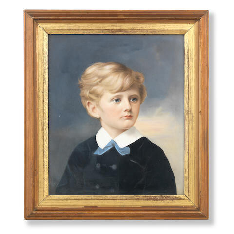 A late 19th century German porcelain portrait plaque depicting a young blonde haired boy