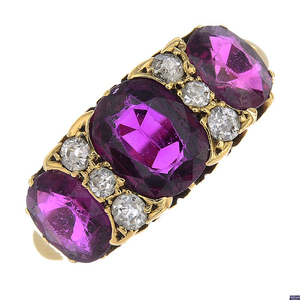 A late Victorian 18ct gold Thai ruby three-stone and diamond ring.