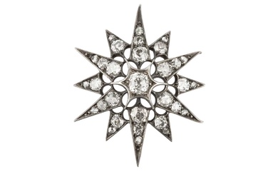 A late Victorian/Edwardian diamond star brooch/pendant, set throughout with graduated...