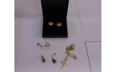 A pair of 18ct (575) gold earrings, a pair of 9ct gold earri...