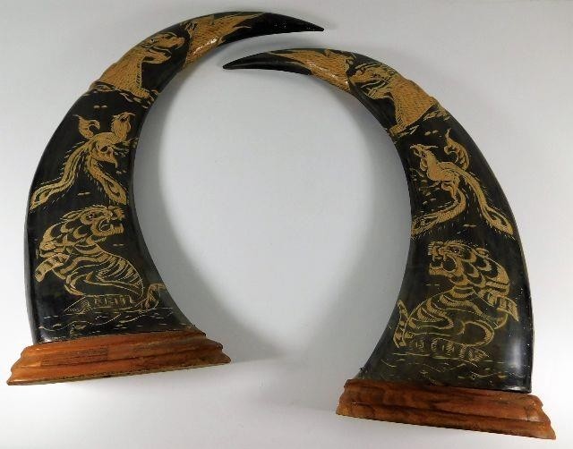 A pair of Chinese carved water buffalo horns, mounted approx...