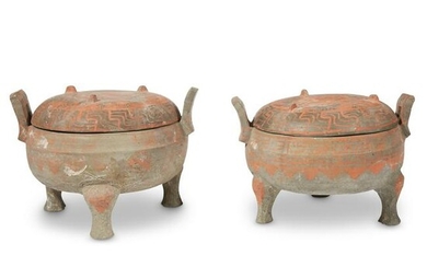 A pair of Chinese painted grey pottery covered tripod