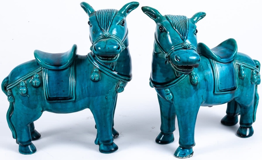 A pair of Chinese turquoise-glazed porcelain horses 25 x...