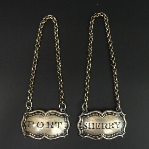 A pair of Victorian silver decanter labels, Port & Sherry, L...