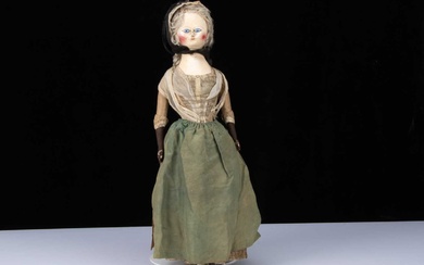 A rare and fine 1780s English wooden doll