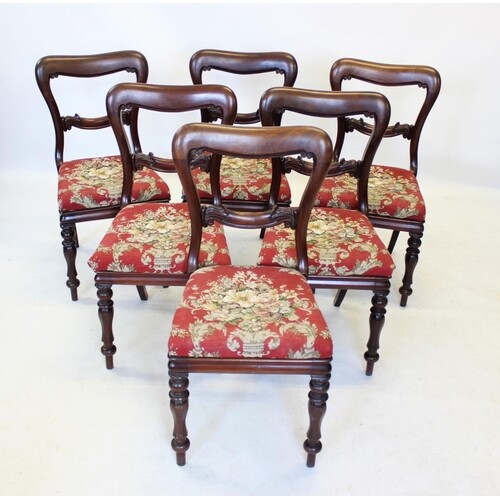 A set of six Victorian mahogany buckle back dining chairs, t...