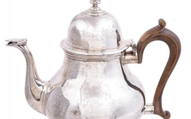 A silver baluster tea pot by Tessiers