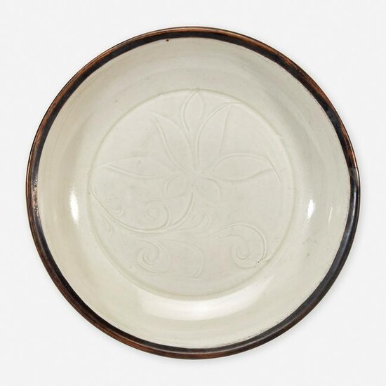 A small Chinese Dingyao incised "Lotus" dish 定