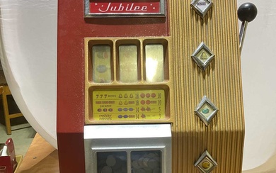 A vintage Jubilee one armed bandit.Condition Report Unable to test...