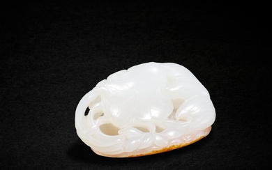 A white and russet jade 'fish and lotus' pendant, Qing...