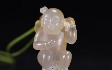 AN AGATE CARVED FIGURE