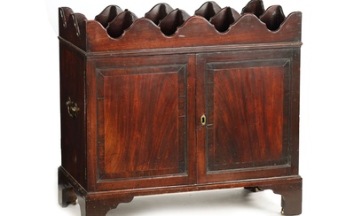 AN EARLY GEORGE III FIGURED MAHOGANY BUTLER’S CELLARETTE with...