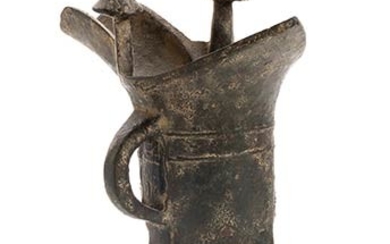 AN INSCRIBED BRONZE TRIPOD RITUAL VESSEL, JUE China, Shang dynasty...