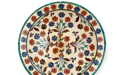 AN IZNIK FLOWER DISH, OTTOMAN, TURKEY, 17TH CENTURY