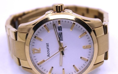 Accurist Gold Tone Quartz Watch. Boxed. The watch also comes...