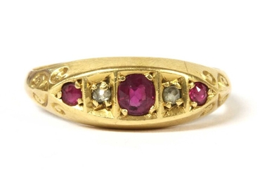 An 18ct gold five stone ruby and diamond ring