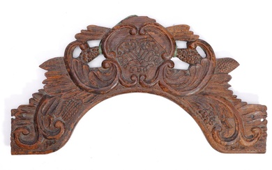 An 18th century Baroque carved wood gable of a cradle with leaves...