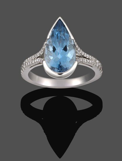 An Aquamarine and Diamond Ring, a pear cut aquamarine in...