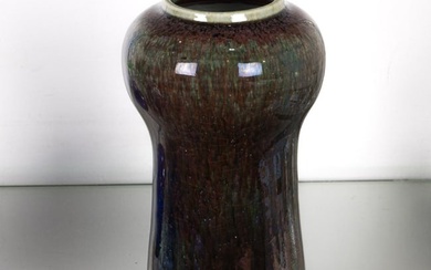 An Art Nouveau flambe glazed porcelain vase