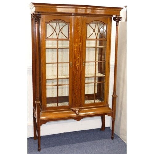 An Edwardian Mahogany Display Cabinet having all over marque...
