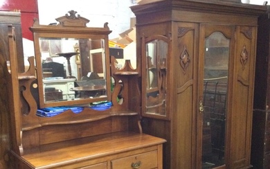 An Edwardian mahogany CWS Pelaw wardrobe and dressing table, the...