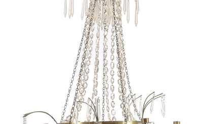 An Empire five light crystal chandelier with sheet brass frame. Ca. 1820. H. 75 cm. Diam. 70 cm.