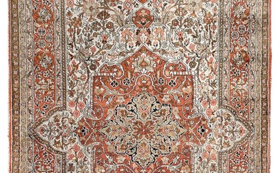 An Indian silk rug, mid 20th century.