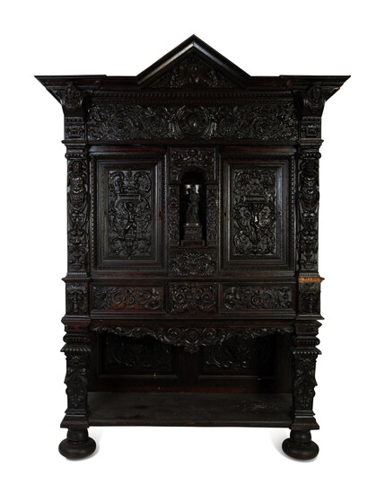 An Italian Baroque Style Carved Oak Cabinet on Stand