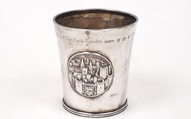 An 'Oxford Millenary Medal' silver beaker, Birmingham, c.1911, G Payne & Son, designed with applied medallion decoration to sides and engraved 'Commissioned by Payne, silversmiths of Oxford. Designed by Cecil Thomas, hand engraved by Henry W. Page...