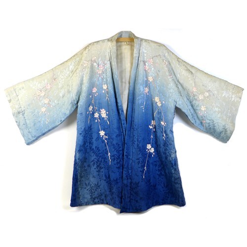 An early 20th century Japanese haori padded jacket, embroide...