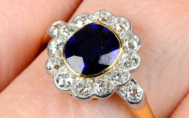An early 20th century platinum and 18ct gold sapphire and old-cut diamond cluster ring.
