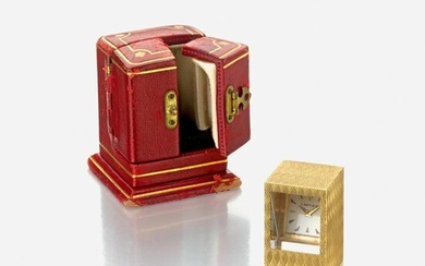 An eighteen karat gold desk clock, Cartier, "Prism