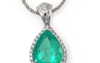 An emerald and diamond necklace set with a Colombian pear-shaped emerald weighing...