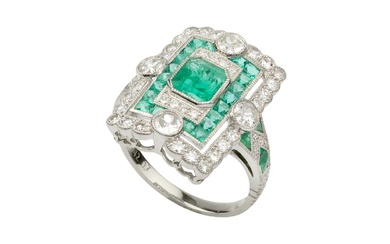 An emerald and diamond panel ring, centred with an octagonal...