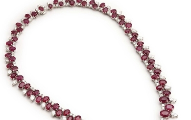 An important ruby and diamond necklace with oval and pear-shaped rubies weighing 50.00 ct. and diamonds weighing 13.00 ct., mounted in 18k white gold.