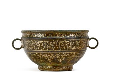 An oval bronze handled vessel, Eastern Zhou dynasty, Spring and Autumn period, the gilded decoration applied in the 20th century 東周春秋時期 銅夔龍紋敦 描金為二十世紀後加