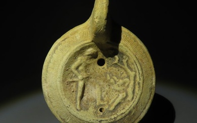 Ancient Roman Terracotta Oil lamp with Meleager and the Calydonian Boar. Spanish Export License. 2nd-3rd century AD.11.5 cm