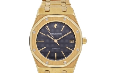 Audemars Piguet Royal Oak | A yellow gold wristwatch with date and bracelet, Circa 1978