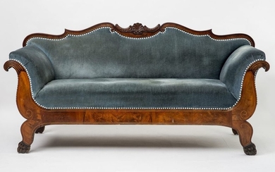 Biedermeier sofa. Mahogany. On flared legs, smooth frame,...