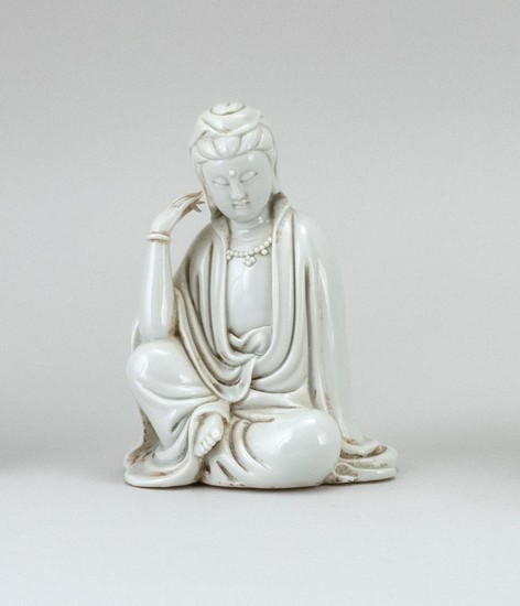 CHINESE BLANC DE CHINE PORCELAIN FIGURE OF GUANYIN Seated in a contemplative position. Height 5.2".