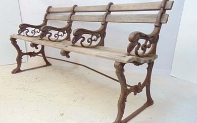Cast iron & wood garden bench with bird heads worked in the cast iron, bench is 66" long, 18" deep