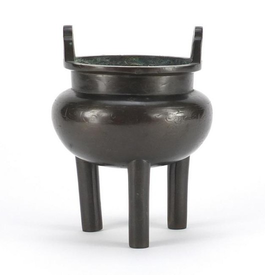 Chinese archaic style bronze tripod censer with twin