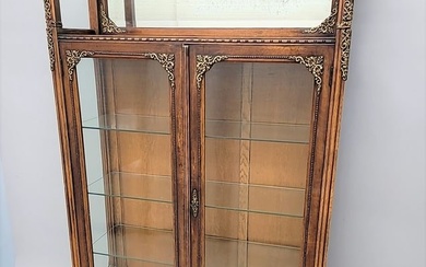 Circa 1890's 1/4 cut oak Brass decorated 2 Door display cabinet with bevel mirror & glass shelves.