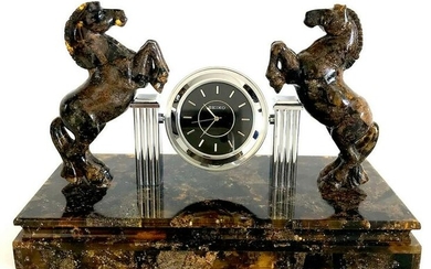 Collectible Baltic amber clock with hand carved horses