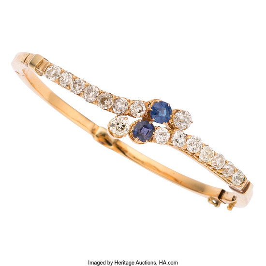 Diamond, Sapphire, Gold Bracelet The bracelet features European-cut diamonds...
