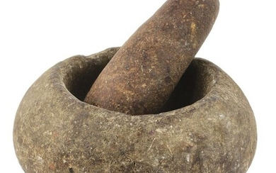 EARLY STONE MORTER AND PESTLE.